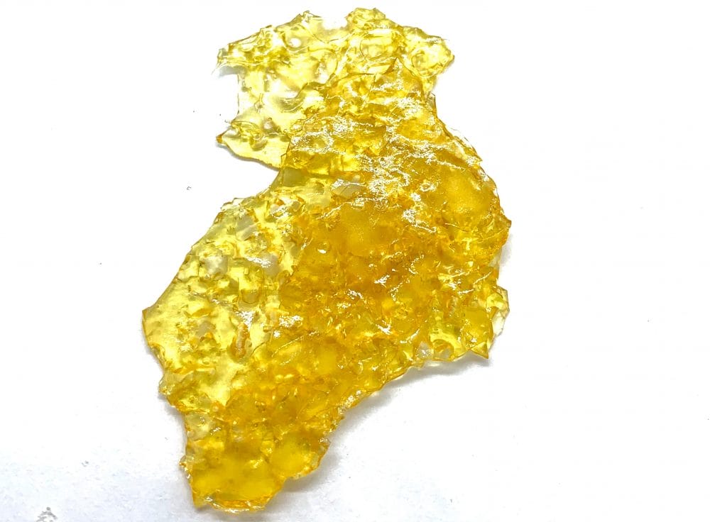 Sour Diesel Shatter-cannabisden | CannaBlossom Canada